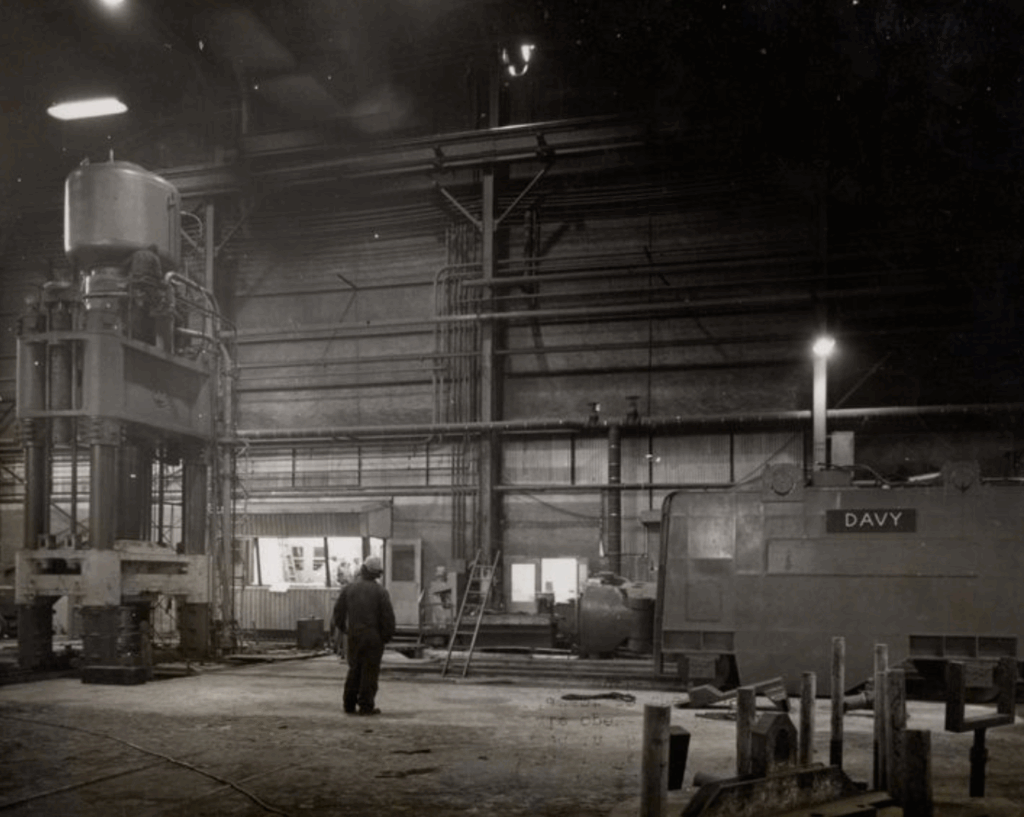 Photograph of new $20 million machineshop at Atlas Steels featuring the Davy-Lowey Hydraulic Manipulator.